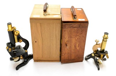 Lot 46 - Watson & Sons Kima Microscope no.66813, black lacquered, with three lens turret, condenser with...