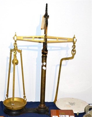 Lot 65 - An Avery Cast Iron and Brass 10lb Shop Beam Scale, with gilt and black decoration, ceramic pan
