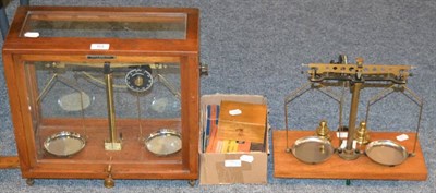 Lot 83 - Griffin & George Precision Balance in glazed case and a similar uncased example and a set of...