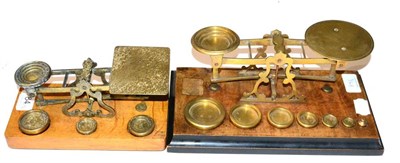 Lot 84 - Postal Scales two brass scales (i) on walnut base with round pans, weights from 8oz to 1/4oz (7...