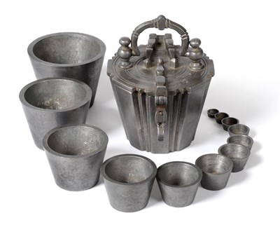 Lot 86 - Cup Weights a Continental set of 13 with outer section with carrying handle, with various stamping