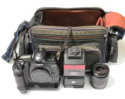 Lot 125 - Canon EOS1V Camera with Canon EF f4-5.6, 35-80mm lens and Cobra flash; in soft carry case