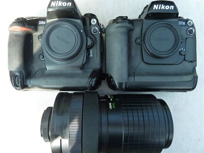 Lot 153 - Nikon Two Digital Cameras D2H and D1H (bodies only) and a Galaxy Mirror f8, 500mm lens