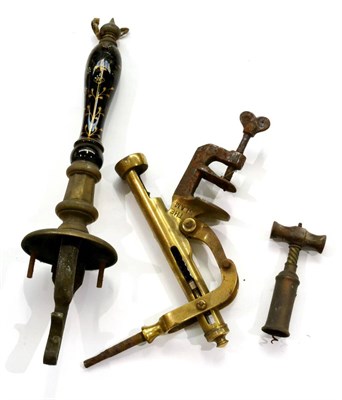 Lot 210 - A Brass Bar Top Corkscrew 'The Slam', with steel mounting screw, together with a ceramic beer...