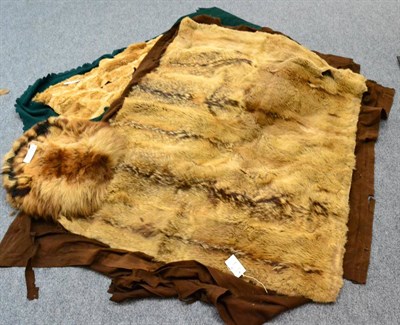 Lot 321 - An Animal Skin Mounted Car Rug, probably made from Coyote, on a brown felt backing, 140cm by 108cm