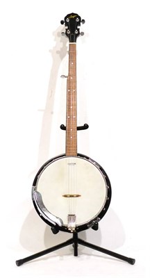 Lot 50 - A Saga 5-String Banjo, with a 29cm head, mahogany resonator and neck, in a plush lined case,...