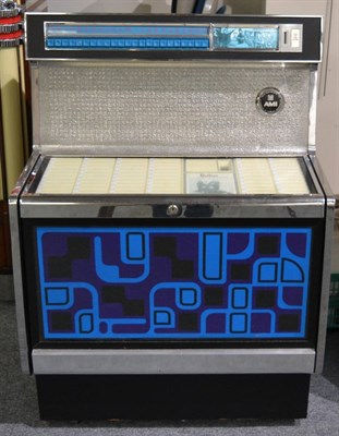 Lot 74 - A Rowe Ami Model R1-1G 1970's Juke Box, serial number 828509, with blue glass fascia, plays...