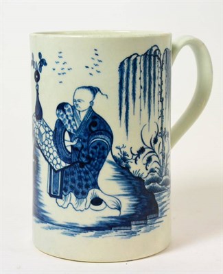 Lot 6 - A Worcester Porcelain Cylindrical Mug, circa 1770, painted in underglaze blue with the  "The...