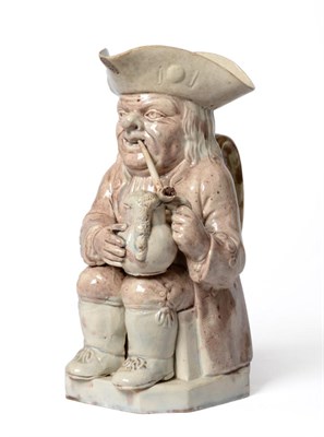 Lot 10 - A Ralph Wood Type Pottery Toby Jug, circa 1780, of traditional form holding a jug and smoking a...