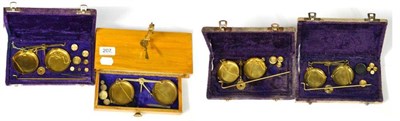 Lot 207 - Small Scale Four Examples one in wooden case and three in flock covered cases, all with gram...