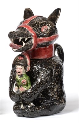 Lot 13 - A Staffordshire Pottery Bear Jug and Cover, early 19th century, naturalistically modelled holding a