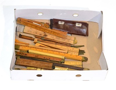 Lot 229 - Folding Rulers a collection of various wood/brass examples, a few all metal and other items (20)