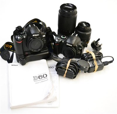 Lot 285 - Nikon Two Camera Bodies D60 no.7429734 and D40X no.3148941; together with Nikkor AF-S f4.5-5.6...