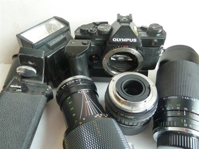 Lot 287 - Olympus OM2 Camera  with Olympus f4, 35-70mm lens, Olympus f4, 65-200mm, Miranda...