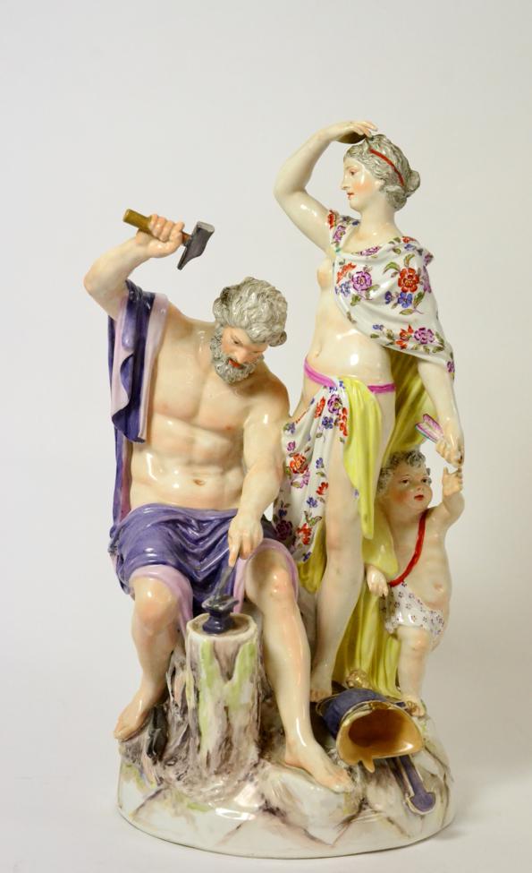 Lot 26 - A Berlin Porcelain Figure Group, late 19th century, as Vulcan sitting at an anvil, Venus and...