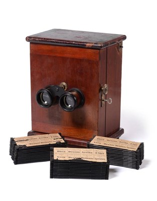 Lot 324 - Ica AG (Dresden) Stereoviewer in mahogany case with three fan-fold slide holders with slides