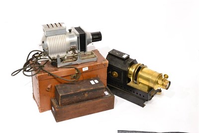 Lot 335 - Riley Prastantia Magic Lantern, fitted with electric lighting, an Aldis Butcher aluminium magic...