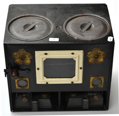 Lot 3 - A Rippingilles Patent No.630 Portable Stove, with black tinplate body, twin hobs, hinged door, twin