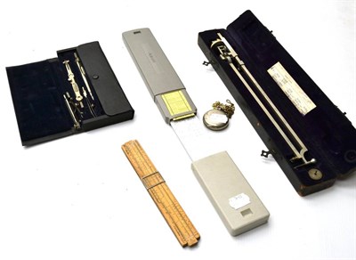 Lot 25 - Various Instrument including a cased Planimeter, cased compass set, two slide rules and a...