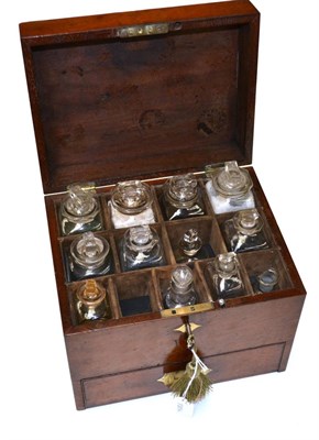 Lot 43 - Apothecary Chest mahogany case with brass fitting; 13 slots with 12 glass bottles in top and a...