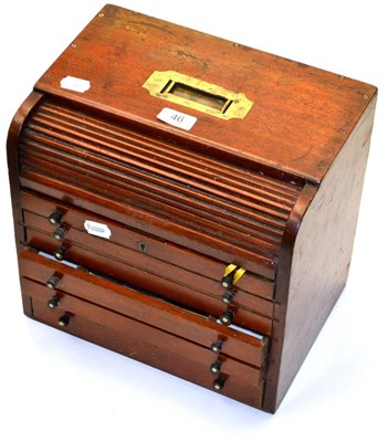 Lot 46 - Cased Set Of Dental Instruments in six drawer mahogany chest with lockable roller cover...