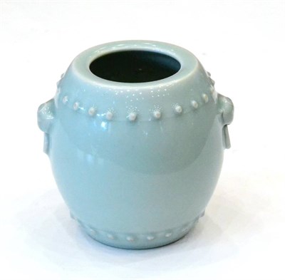 Lot 38 - A Chinese Celadon Glazed Barrel Shaped Vase, with mask and loop handles, bears six character...