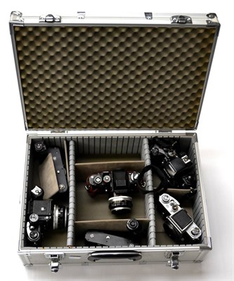 Lot 108 - Nikon Four Cameras (i) F no. 6937649 with TTL metering prism and Nikkor-S f1.4, 50mm lens (ii)...