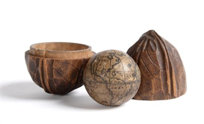 Lot 21 - Pocket Globe, 18th Century approximately 1";, 2.5cm diameter in wooden case shaped like a...