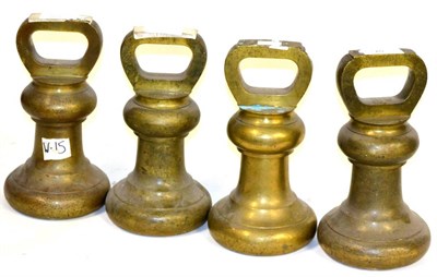 Lot 52 - A Set of Four Avery 56lb Brass Bell Weights