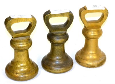 Lot 56 - Three Avery 14lb Brass Bell Weights