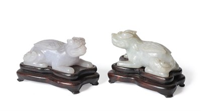 Lot 68 - A Pair of Chinese Jade Figures of Winged Kylins, the recumbent beasts with heads raised, 7.5cm...