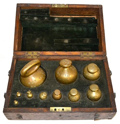 Lot 59 - A Cased Part Set of Ten Spherical Brass 'Avoir' Weights, sizes from 7lb to 4dr, with various...