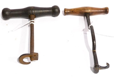 Lot 101 - An 18th Century Iron Tooth Key, with turned wood handle, together with a 19th Century Steel...