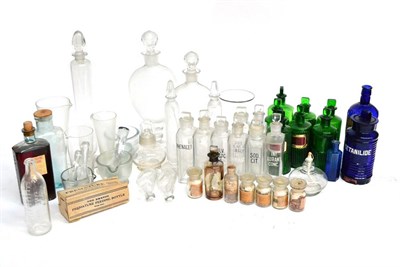 Lot 104 - A Collection of Glass Chemists Bottles and Jars, including blue glass, green glass and clear glass