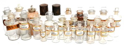 Lot 105 - A Collection of Twenty Five Clear Glass Chemists Rounds, with verre eglomise and gilt labels,...