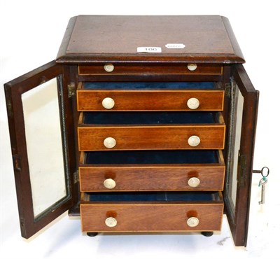 Lot 106 - A Small Mahogany Chest of Drawers, with five graduated ivory handled drawers, under glazed...