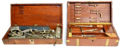 Lot 112 - A Mahogany Cased Part Set of Surgical Instruments by Millikin & Lawley, the brass bound case...