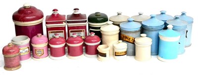 Lot 125 - A Collection of Twenty Two Pottery Drug Jars, most with lids, includes blue, pink, green and white