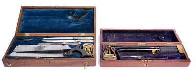 Lot 129 - A 19th Century Mahogany Cased Part Amputation Set, containing two ebony handled knives, small ebony