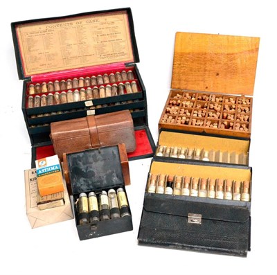 Lot 150 - A Boxed Set of Organic Specimens, all in numbered glass bottles, in four lift-out trays, in a...