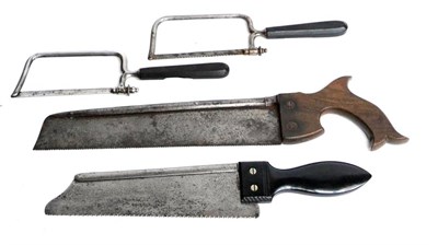 Lot 166 - Four Steel Bone Saws, three with ebony handles, no makers names, one with walnut handle by Stoddart