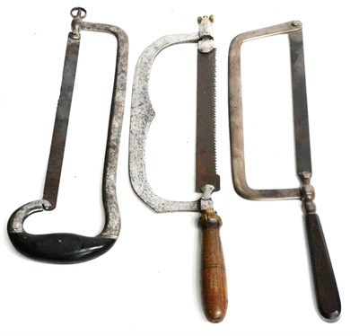 Lot 168 - Three Large Steel Bone Saws, one with beech handle, two with ebony handles, no makers names