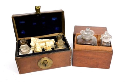 Lot 176 - A 19th Century Stitched Leather Cased Set of Glass Medicine Bottles, containing eight bottles...