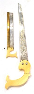 Lot 193 - Two Ivory Handled Medical Saws (i) with curved handle and floral decoration engraved to blade, also