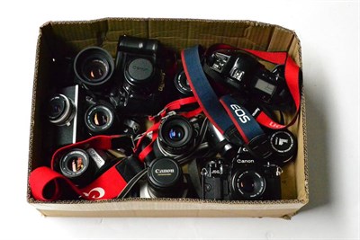 Lot 220 - Canon Camerasb FTb QL with f1.8, 50mm lens, AL1 with f1.8, 50mm lens, 2xT70s (both with...