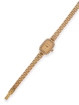 Lot 93 - A Lady's 9ct Gold Diamond Set Wristwatch, signed Bueche Girod, circa 1980, quartz movement,...