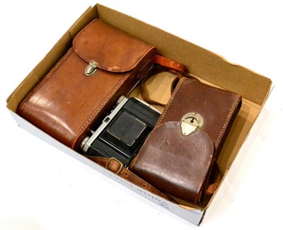 Lot 234 - Kodak No.1A Pocket Camera in leather case; together with a Houghton-Butcher Mulchro folding...