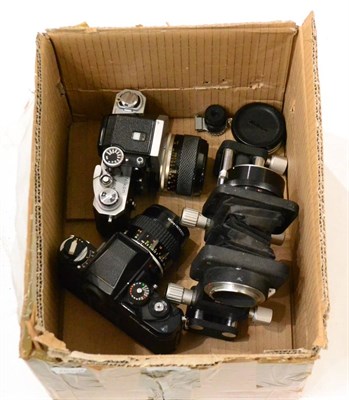 Lot 269 - Nikon F Photomic FTN Camera No.726993 with Nikkor P f3.5, 55mm lens; a Nikon F3 and a PB5...