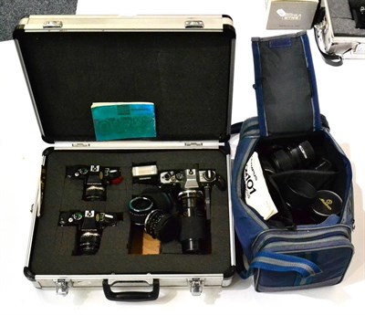 Lot 275 - Olympus Four Cameras OM101 Power Focus, 2xOM40 Program and OM10; with various lenses and...