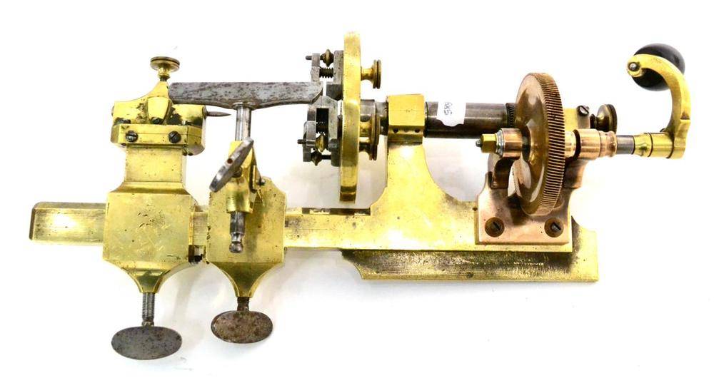 Lot 24 - Watchmakers Lathe constructed mainly in brass with hand cranked turntable and three jaw vice,...